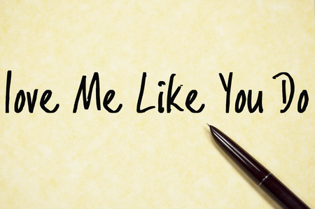 love me like you do text write on paperの写真素材
