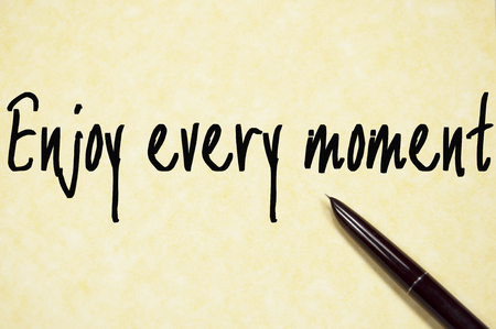 enjoy every moment signの写真素材
