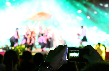 The audience shoots the party with a cell phoneの写真素材