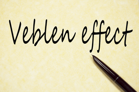 Veblen effect text write on paperの写真素材