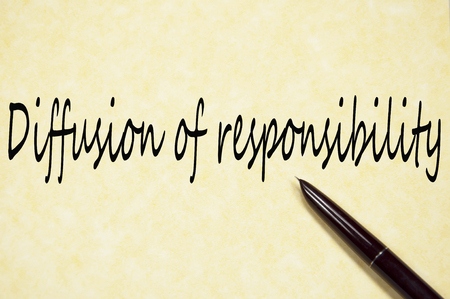 Diffusion of responsibility text write on paperの写真素材