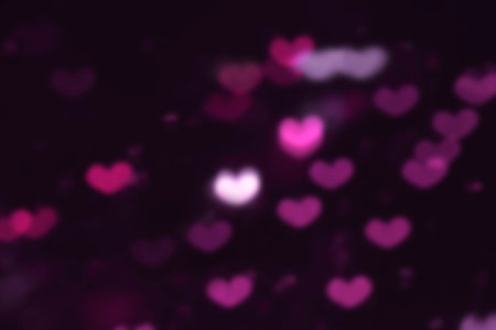 Purple Hearts. St. Valentine's Day Dark background
