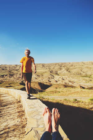 Happy Couple love and travel man and woman family travelers lifestyle summer vacations outdoor Georgia mountainsの写真素材