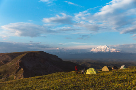 People Camping tent in Mountains Caucasus Elbrus Landscape Travel Lifestyle concept adventure...