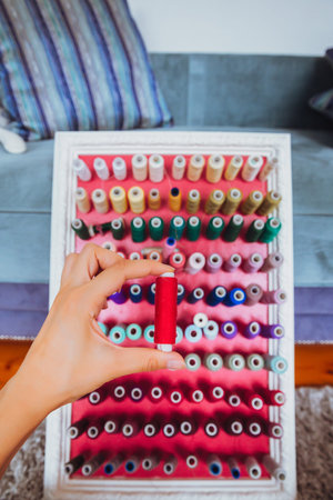 multi color Spools of thread needlework, sewing, tailoring and tailoring concept.