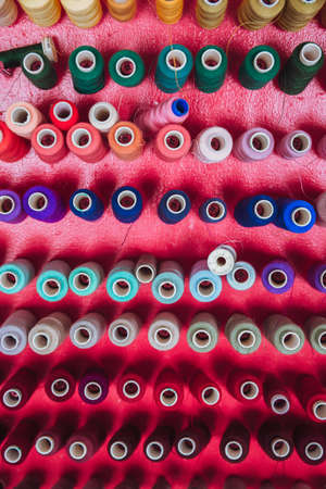 multi color Spools of thread needlework, sewing, tailoring and tailoring concept.の写真素材