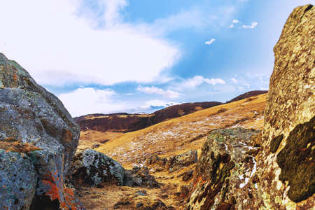 Beautiful winter mountain landscape. Yellow cliffs. Blue skyの写真素材