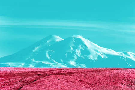 pink and blue art of Mount Elbrus Snowy peak. Nature and mountains landscapeの写真素材