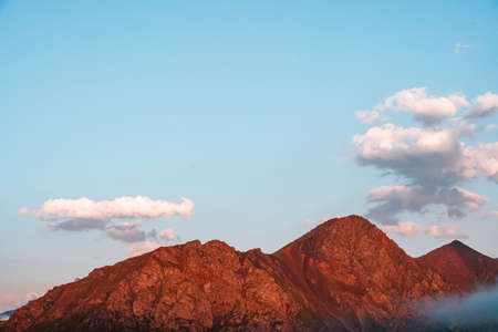 Red Mountains cliffs of the North Caucasus at sunsetの写真素材