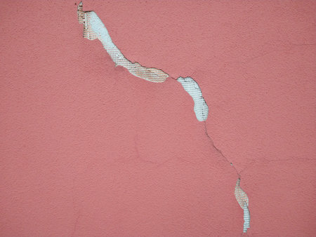 Classic cracked wall in pink colorの写真素材