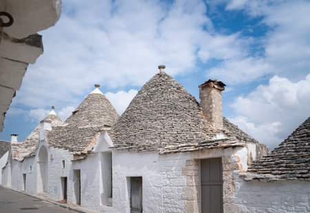 Characteristic street of Alberobello with Trulli charmの写真素材