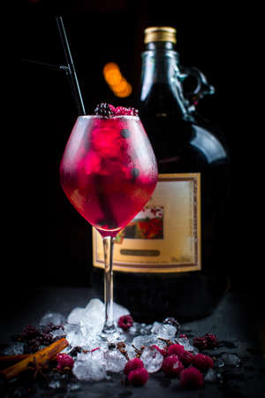 Beautiful and original cold fruit smoothie with fresh raspberries, cinnamon and ice cubesの写真素材