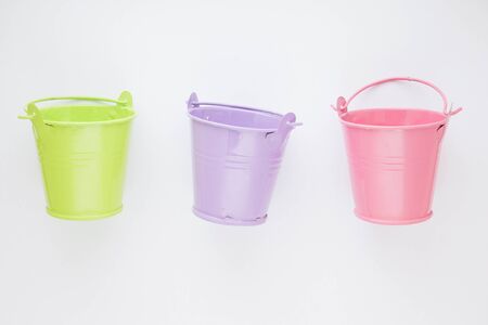 colorful bucket isolated white background. a small canの写真素材