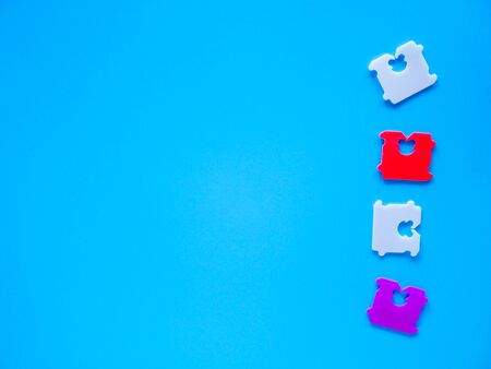 Price Tag Bread Clip and blue background. The color of plastic tags on bread bag use to tell you which day of the week breadの写真素材