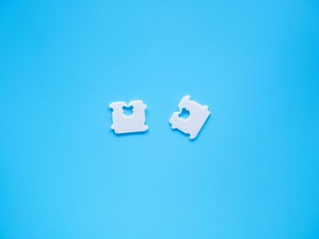 Price Tag Bread Clip and blue background. The color of plastic tags on bread bag use to tell you which day of the week breadの写真素材