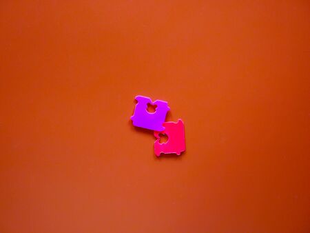 Price Tag Bread Clip on brown background. The color of plastic tags on bread bag use to tell you which day of the week bread was baked on.の写真素材