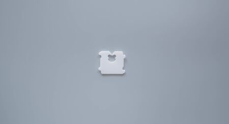 Price Tag Bread Clip on gray background. The color of plastic tags on bread bag use to tell you which day of the week bread was baked on.の写真素材