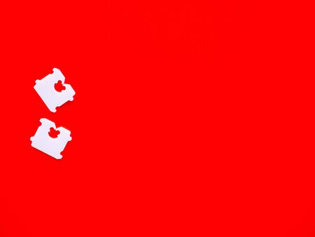 Price Tag Bread Clip and red background. The color of plastic tags on bread bag use to tell you which day of the week bread was bakedの写真素材