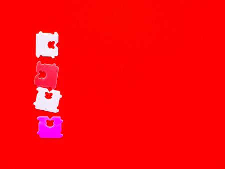 Price Tag Bread Clip and red background. The color of plastic tags on bread bag use to tell you which day of the week bread was bakedの写真素材