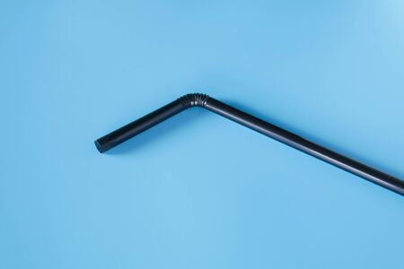drinking straws on blue backgroundの写真素材