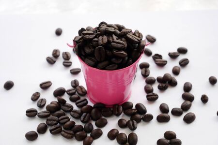 organic aroma coffee beans on white background. coffee bucketの写真素材