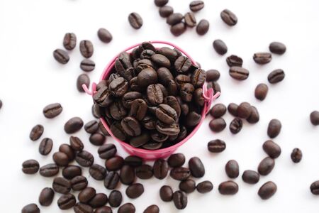 organic aroma coffee beans on white background. coffee bucketの写真素材