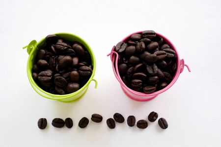organic aroma coffee beans on white background. coffee bucketの写真素材