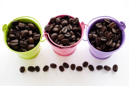 organic aroma coffee beans on white background. coffee bucketの写真素材