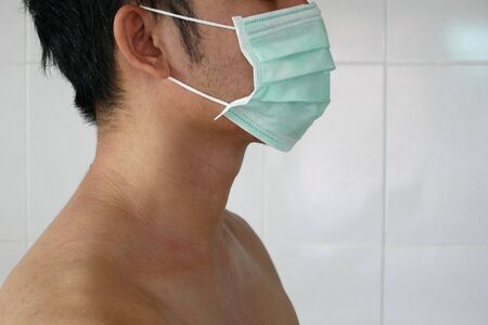Doctor wearing protection face mask against coronavirus.の写真素材