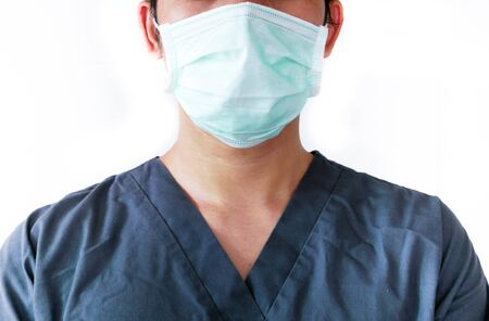 Doctor wearing protection face mask against coronavirus.の写真素材