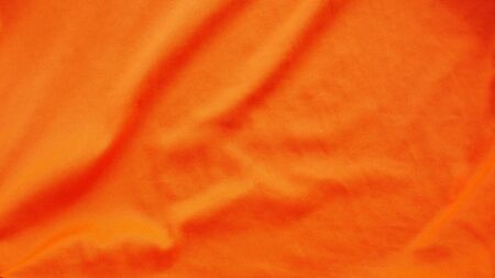 orange silk satin texture, cotton fabric backgroundの写真素材