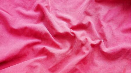 red silk satin texture, pink cotton fabric backgroundの写真素材