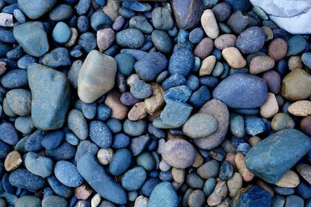 black pebble beach stone backgroundの写真素材