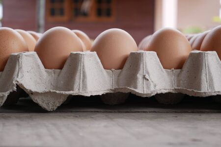 fresh eggs in a basket concept healthy foodの写真素材