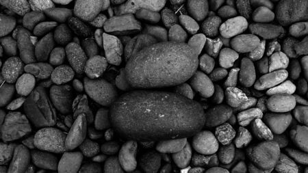 black stone for background, pebble beach stoneの写真素材