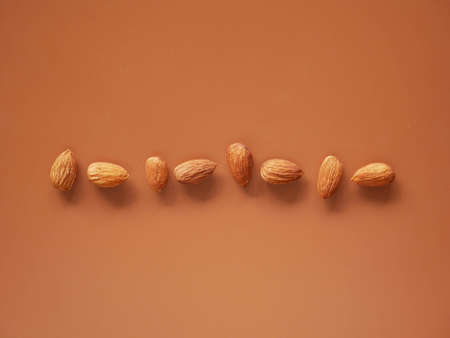 Almonds isolated on background, nut beansの写真素材