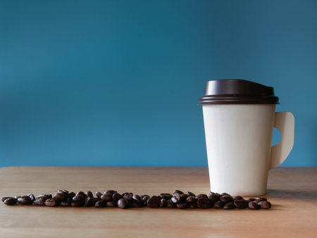 Paper coffee cup in coffee shop.