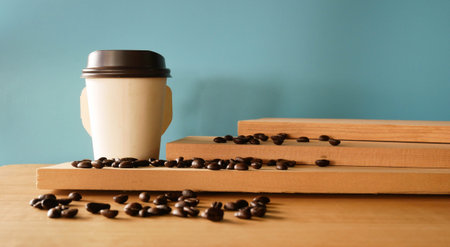 Paper coffee cup in coffee shop.