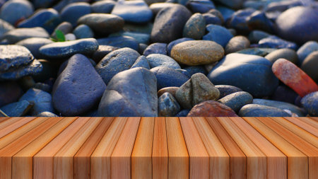 wood table and pebble stone texture on the ground for product display