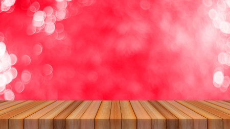 Wood table top on bokeh abstract red background can be used for montage or display your products