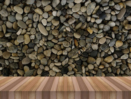 wood table and pebble stone texture on the ground for product displayの写真素材