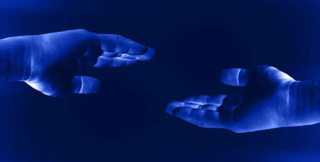 two blue hands background.の写真素材