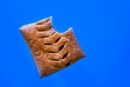 delicious homemade cherry pie on blue background
