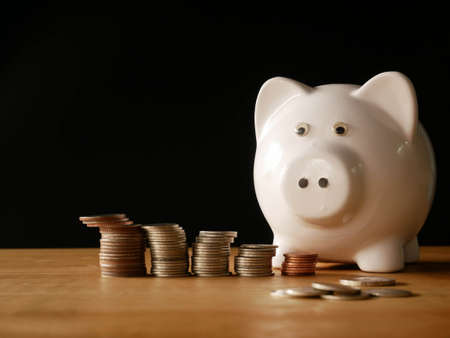 piggy bank and coins concept save moneyの写真素材