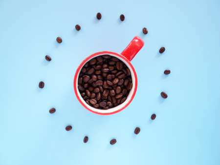 Black coffee cup on background with Coffee beansの写真素材