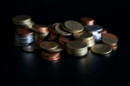 stacks of coin on black background, business bankingの写真素材