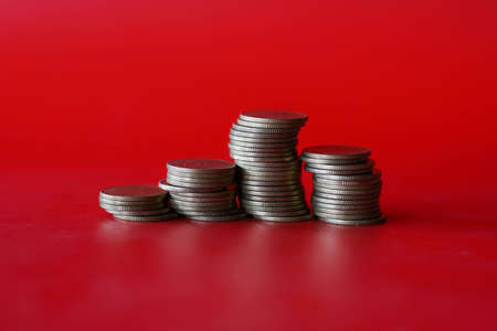 stack of gold coins on white background. business money and coinの写真素材