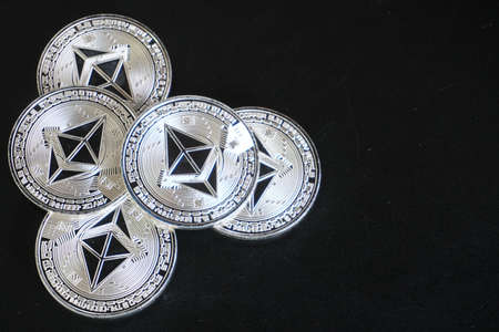 bitcoin on black background with selective focusの写真素材