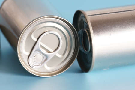 metallic canned on blue backgroundの写真素材