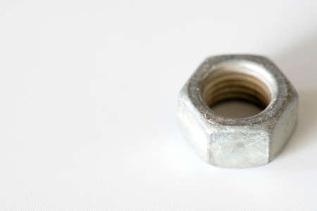 Old rusty nut, metal screw and boltの写真素材